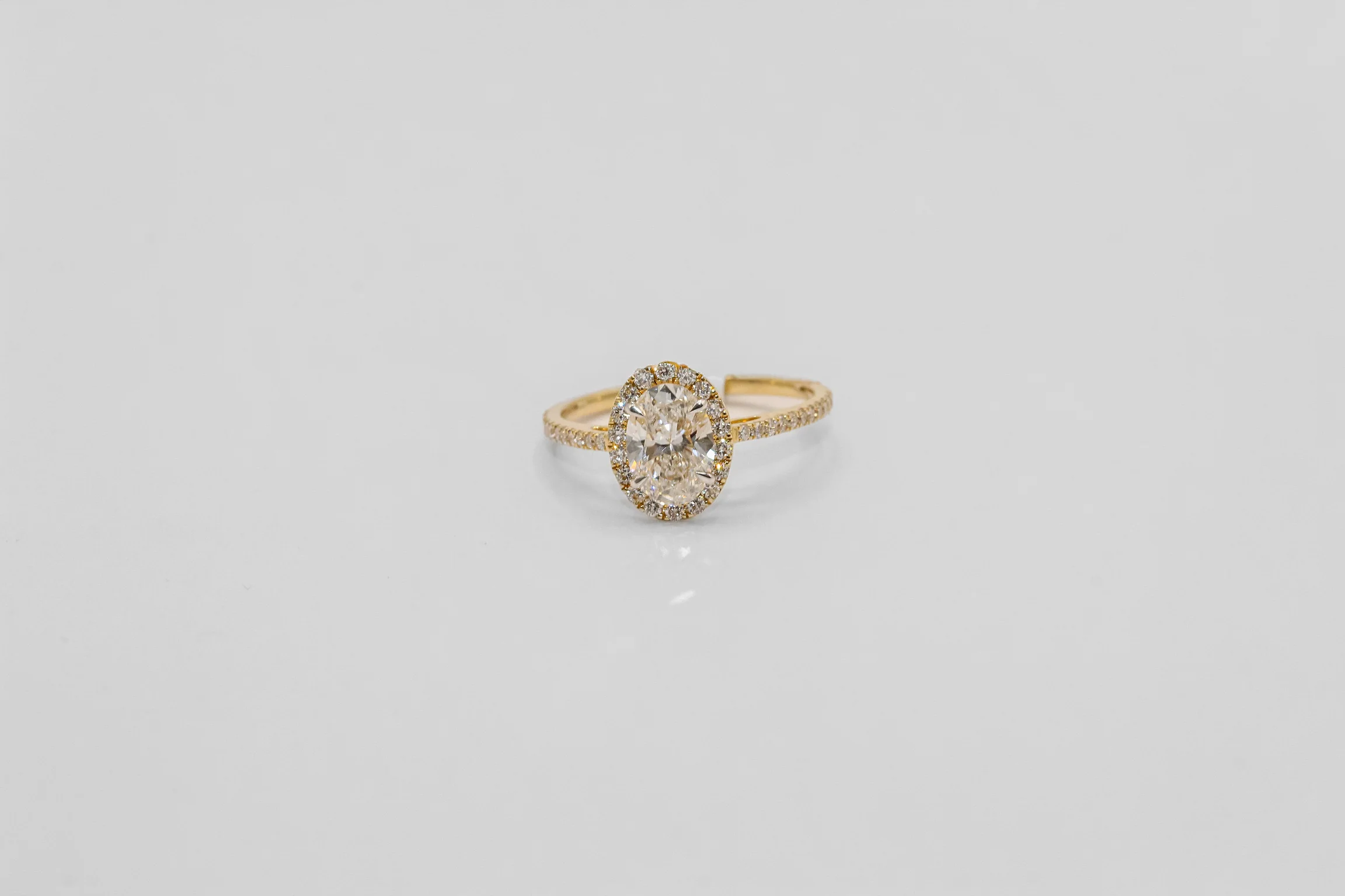 14K Gold Oval Halo Diamond Solitaire Ring