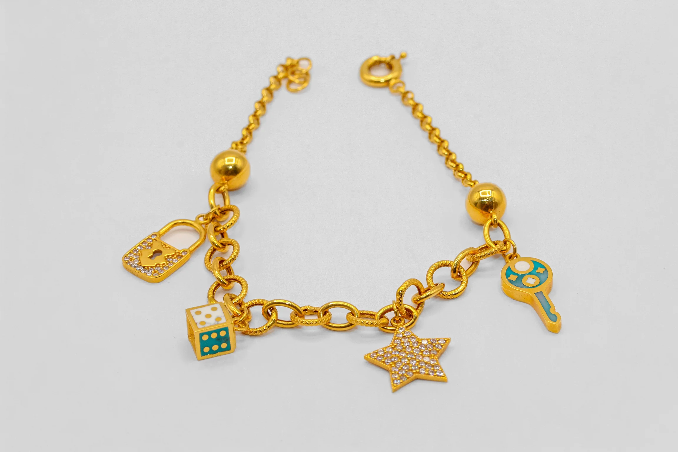 21K Gold Multi Charm Bracelet